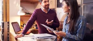 2 people talking at work