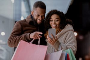 A couple looking at their phone